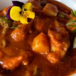 Image shows a bowl of Molé Amarillo Stew