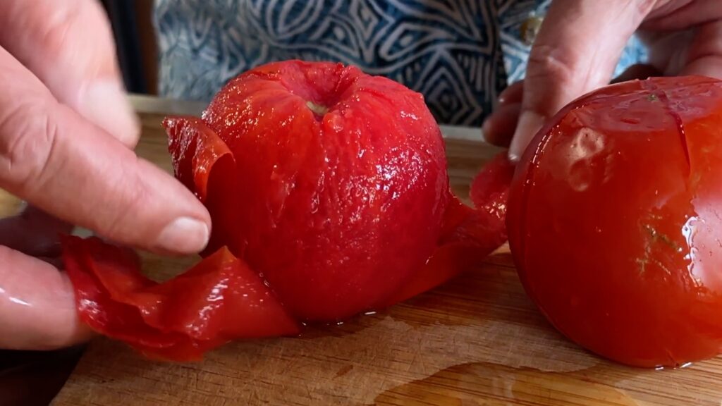 Picture shows the tomato peels coming off easily