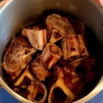 Photo shows bones in the stock pot