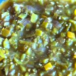 Photo shows a dish of green chile sauce