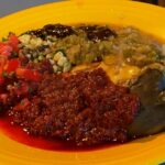 Photo shows Stuffed Chilis Christmas Style on a bright yellow plate