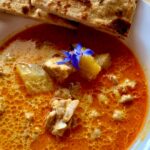 Photo shows Red Chicken Curry Plated