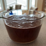 Photo shows bowl of chocolate mousse