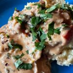 Photo shows Pollo Con Crema plated
