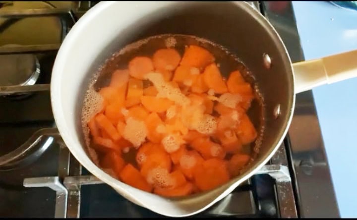 Photo shows the carrots in a pan of water