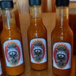 Photo shows hot sauce bottles