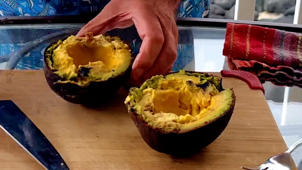 Photo shows the cut avocado bright yellow inside