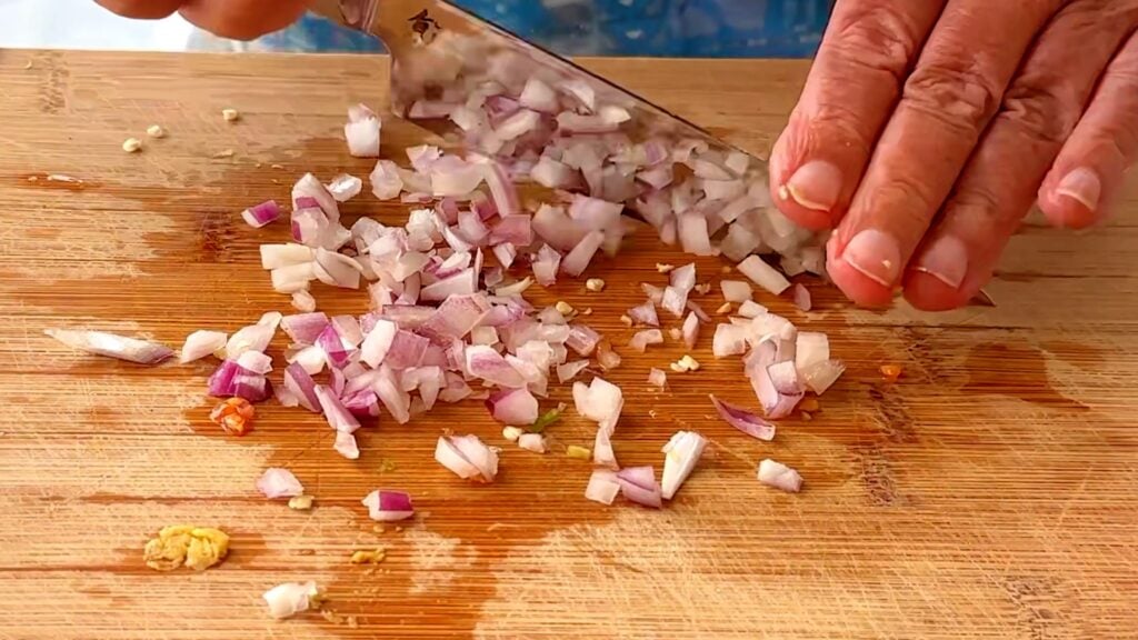 Photo shows Dicing the onion