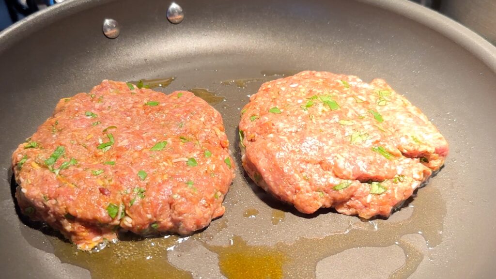 Cook the hamburger in oil