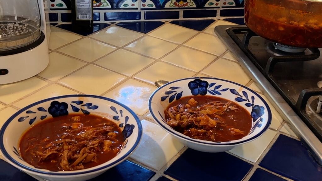 Photo shows pozole in two bowls
