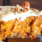 Photo shows a piece of Gluten Free Carrot Cake