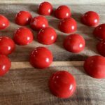 Photo shows cannabis gummies on a cutting board