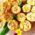 Photo shows mini shrimp cheesecakes srved on a platter