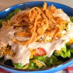 Photo shows a finished taco salad