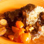 Photo shows Huatape Con Camarones plated