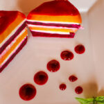 Photo shows the beet tower plated with beet balsamic reduction