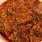Photo shows a bowl of Caribbean Lamb Curry