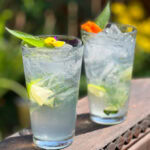 Photo shows 2 pineapple sage mojitos