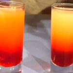 Photo shows 2 finished Pineapple Upside Down Cake Cocktails